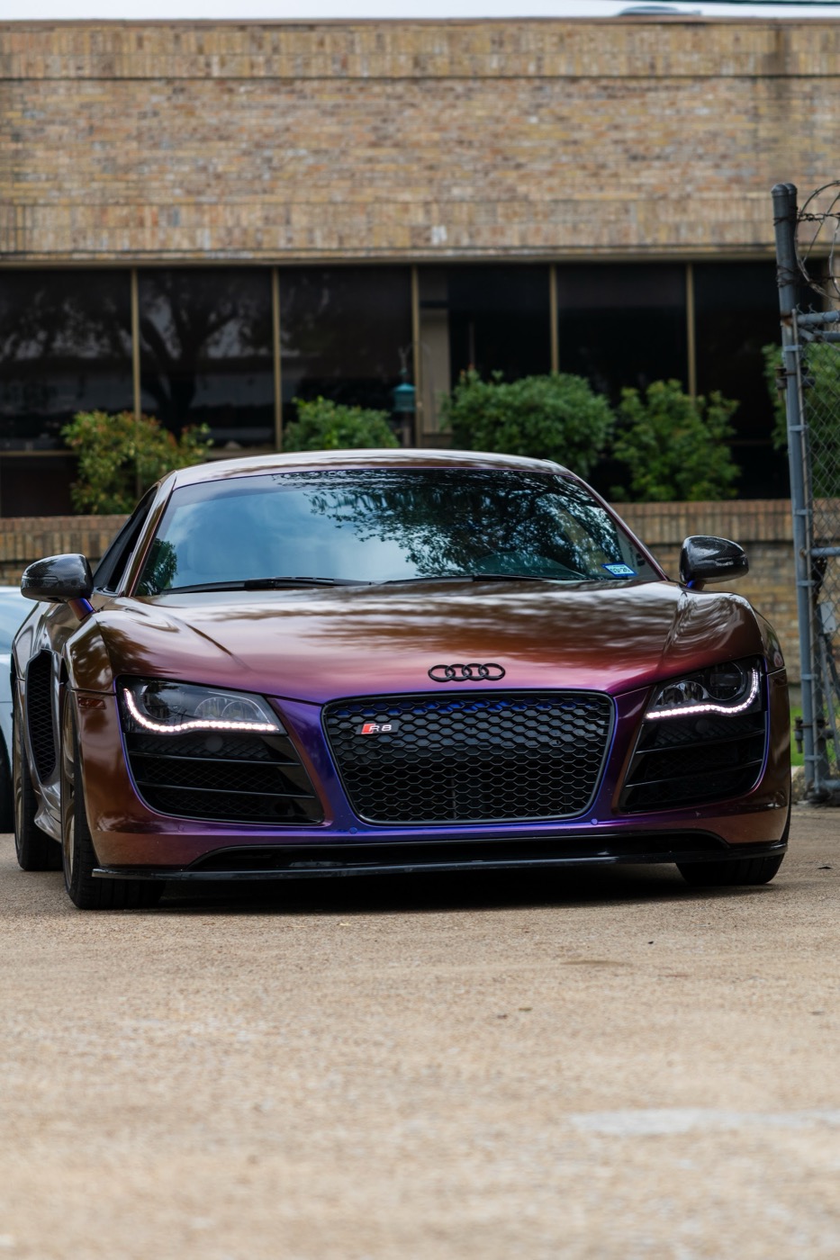 Finished deep-violet Audi R8 from low front angle